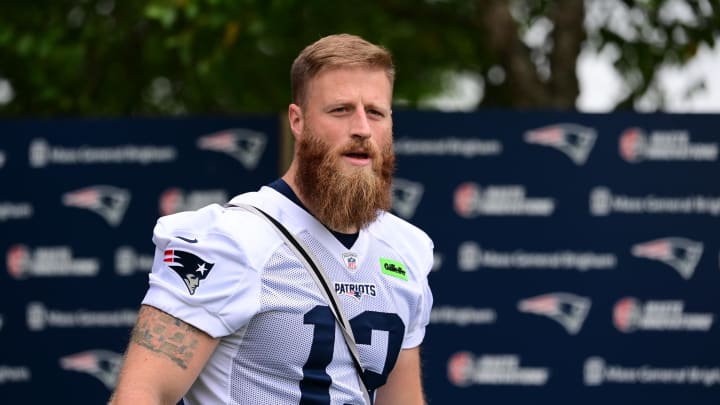 Jul 24, 2024; Foxborough, MA, USA; New England Patriots place kicker Joey Slye (13) walks to the practice field during training camp at Gillette Stadium. Mandatory Credit: Eric Canha-USA TODAY Sports