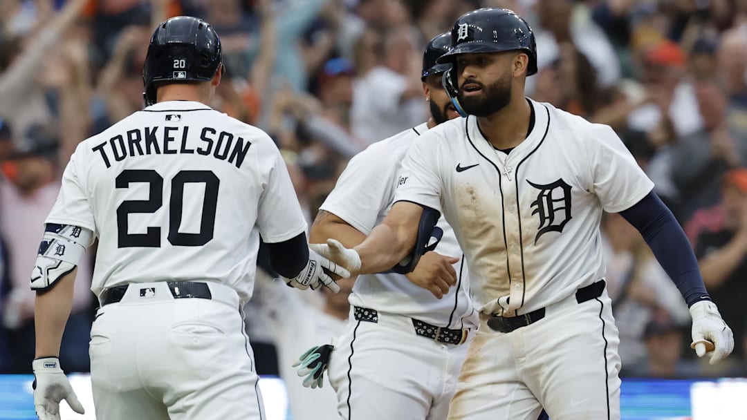 May 12, 2025; Detroit, Michigan, USA;  Detroit Tigers outfielder Riley Greene (31) receives congratulations from first base Spencer Torkelson (20) after he hits a three rum hits an RBI single third inning against the Boston Red Sox at Comerica Park