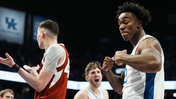 Kentucky Wildcats center Amari Williams (22) flexes after getting the score plus the foul against Arkansas Saturday Feb. 1, 2025 at Rupp Arena in Lexington, Kentucky.