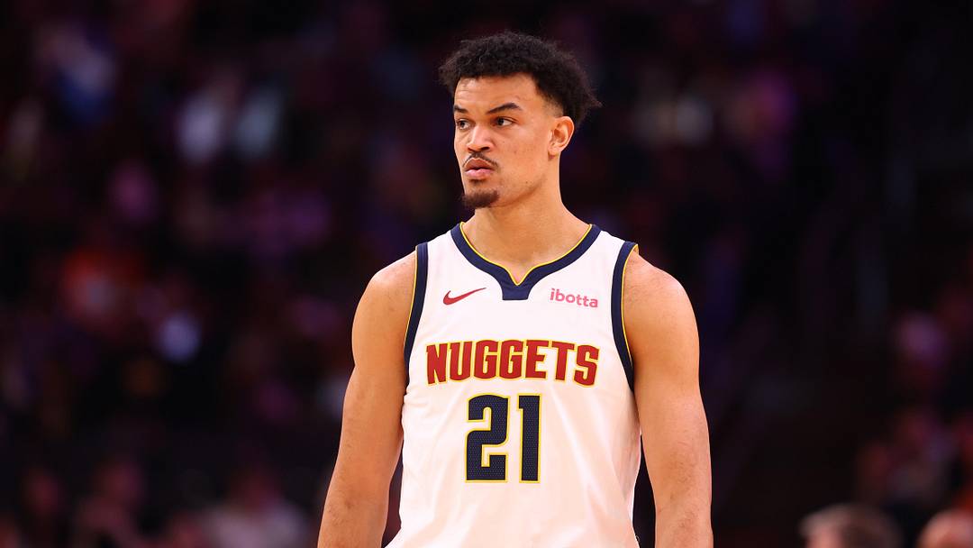 Mar 24, 2026; Phoenix, Arizona, USA; Denver Nuggets forward Spencer Jones (21) against the Phoenix Suns at Mortgage Matchup Center.