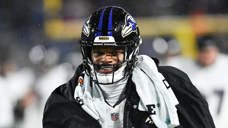 Baltimore Ravens quarterback Lamar Jackson smiles during warm ups. | Mark Konezny-Imagn Images