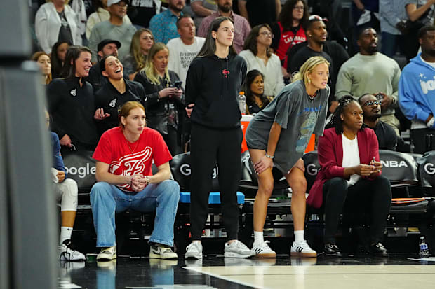 Fever forward Chloe Bibby (55), Indiana Fever guard Caitlin Clark (22), and Indiana Fever guard Sophie Cunningham 