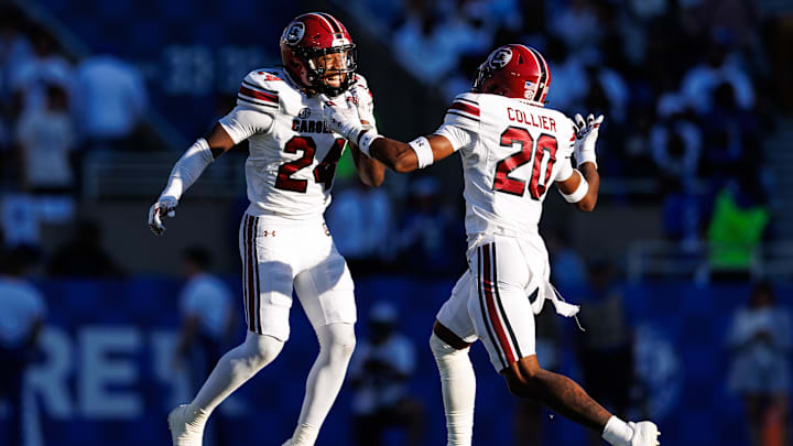 South Carolina football defensive backs Judge Collier (20) and Jalon Kilgore (24)