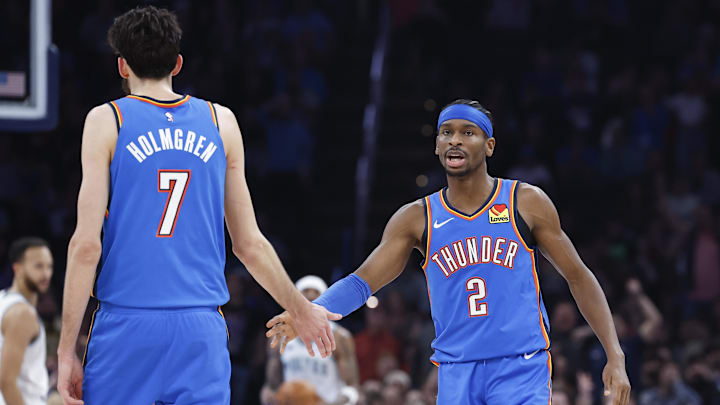 Jan 29, 2024; Oklahoma City, Oklahoma, USA; Oklahoma City Thunder guard Shai Gilgeous-Alexander (2) and Oklahoma City Thunder forward Chet Holmgren (7) celebrate after a play against the Minnesota Timberwolves during the second quarter at Paycom Center. Mandatory Credit: Alonzo Adams-Imagn Images