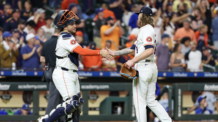 Aug 29, 2024; Houston, Texas, USA;  Houston Astros catcher Yainer Diaz (21) shakes hands with  relief pitcher Josh Hader (71) after defeating the Kansas City Royals at Minute Maid Park. 