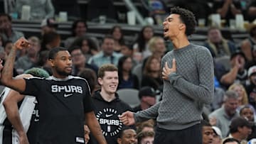 San Antonio Spurs guard Blake Wesley and center Victor Wembanyama celebrate in the second half against the Brooklyn Nets