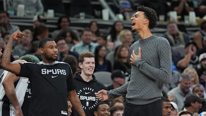 San Antonio Spurs guard Blake Wesley and center Victor Wembanyama celebrate in the second half against the Brooklyn Nets