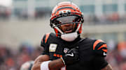 Nov 2, 2025; Cincinnati, Ohio, USA; Cincinnati Bengals wide receiver Ja'Marr Chase (1) acknowledges the crowd after scoring a touchdown against the Chicago Bears during the second quarter at Paycor Stadium. Mandatory Credit: Joseph Maiorana-Imagn Images
