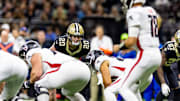 Nov 10, 2024; New Orleans, Louisiana, USA;   New Orleans Saints linebacker Pete Werner (20) stares down Atlanta Falcons quarterback Kirk Cousins (18) during the first half at Caesars Superdome. Mandatory Credit: Stephen Lew-Imagn Images