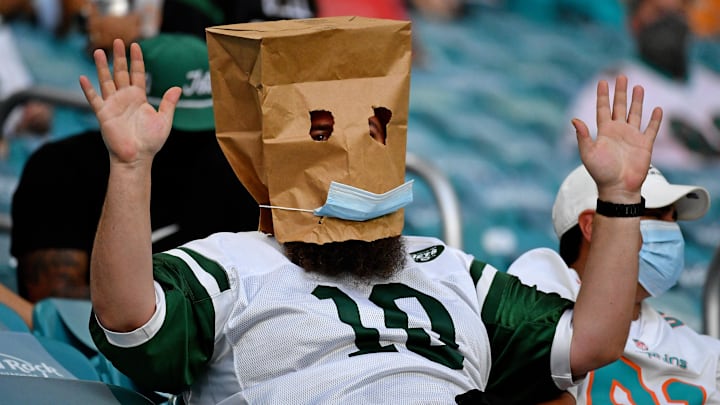 NY Jets fan with paper bag
