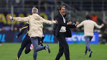 Coach Simone Inzaghi celebrates a famous victory for Inter Milan at San Siro.