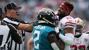 Nov 21, 2021; Jacksonville, Florida, USA; Jacksonville Jaguars free safety Rayshawn Jenkins (2) fights with San Francisco 49ers wide receiver Jauan Jennings (15), Jenkins would be disqualified from the game from a personal foul penalty during the first half at TIAA Bank Field. 
