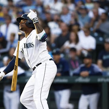 Seattle Mariners left fielder Tim Beckham (1) watches his grand slam home run against the Detroit Tigers during the third inning at T-Mobile Park in 2019.