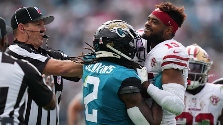 Nov 21, 2021; Jacksonville, Florida, USA; Jacksonville Jaguars free safety Rayshawn Jenkins (2) fights with San Francisco 49ers wide receiver Jauan Jennings (15), Jenkins would be disqualified from the game from a personal foul penalty during the first half at TIAA Bank Field. 