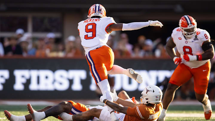 Clemson Tigers safety R.J. Mickens returns an interception against the Texas Longhorns during the CFP National playoff first round at Darrell K Royal-Texas Memorial Stadium. Clemson Tigers safety R.J. Mickens returns an interception against the Texas Longhorns during the CFP National playoff first round at Darrell K Royal-Texas Memorial Stadium.