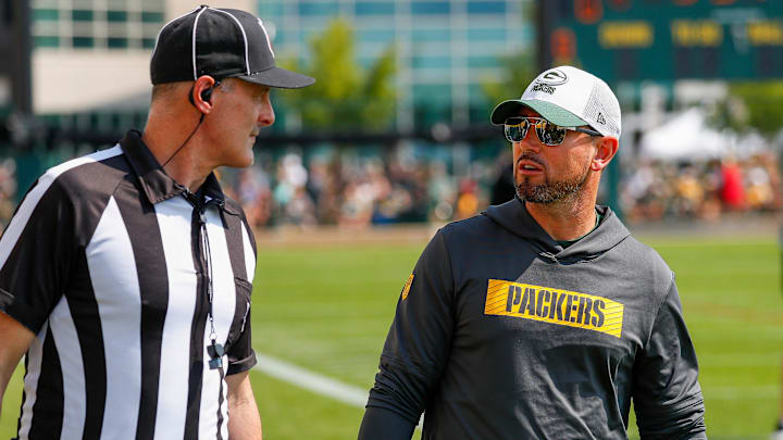 Green Bay Packers head coach Matt LaFleur chats with a referee before practice on Saturday, July 27, 2024, at Ray Nitschke Field in Ashwaubenon, Wis.
Tork Mason/USA TODAY NETWORK-Wisconsin
