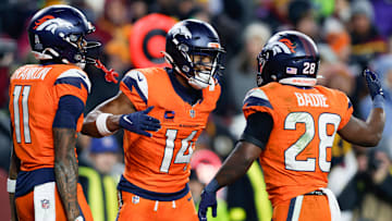 Broncos receiver Courtland Sutton, center, caught a touchdown in the final 30 seconds of the first half of Sunday’s win.