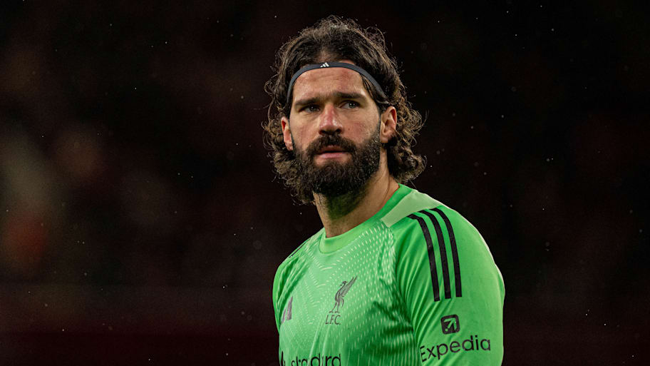 Alisson looking concerned.