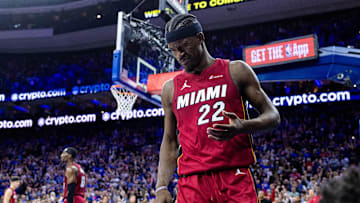 Apr 17, 2024; Philadelphia, Pennsylvania, USA; Miami Heat forward Jimmy Butler (22) reacts after a collision during the fourth quarter against the Philadelphia 76ers in a play-in game of the 2024 NBA playoffs at Wells Fargo Center. Mandatory Credit: Bill Streicher-Imagn Images