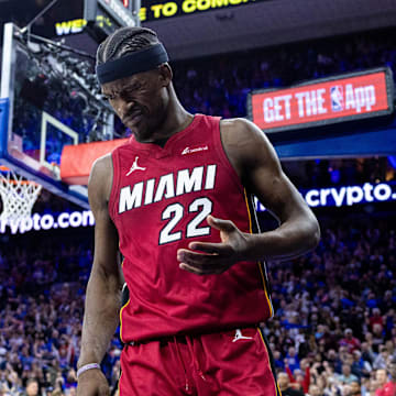 Apr 17, 2024; Philadelphia, Pennsylvania, USA; Miami Heat forward Jimmy Butler (22) reacts after a collision during the fourth quarter against the Philadelphia 76ers in a play-in game of the 2024 NBA playoffs at Wells Fargo Center. Mandatory Credit: Bill Streicher-Imagn Images