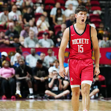 Jul 14, 2024; Las Vegas, NV, USA; Houston Rockets guard Reed Sheppard (15) reacts after scoring against the Washington Wizards during the third quarter at Thomas & Mack Center. Mandatory Credit: Stephen R. Sylvanie-Imagn Images