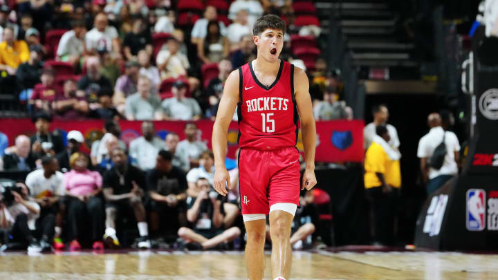 Jul 14, 2024; Las Vegas, NV, USA; Houston Rockets guard Reed Sheppard (15) reacts after scoring against the Washington Wizards during the third quarter at Thomas & Mack Center. Mandatory Credit: Stephen R. Sylvanie-USA TODAY Sports