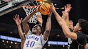 Mar 12, 2025; Kansas City, MO, USA; Kansas Jayhawks forward Flory Bidunga (40) shoots the ball during the first half against the UCF Knights at T-Mobile Center. 