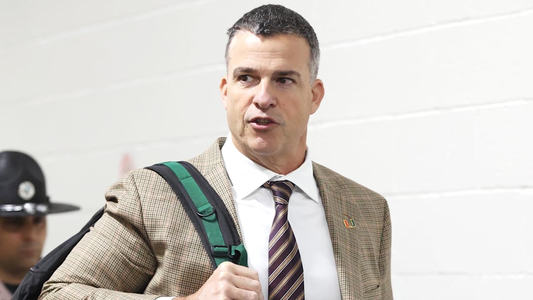 Nov 29, 2025; Pittsburgh, Pennsylvania, USA;  Miami Hurricanes head coach Mario Cristobal arrives at the stadium to coach his team against the Pittsburgh Panthers at Acrisure Stadium. Mandatory Credit: Charles LeClaire-Imagn Images