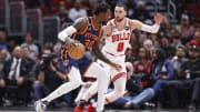 Dec 14, 2022; Chicago, Illinois, USA; New York Knicks forward Julius Randle (30) drives to the basket against Chicago Bulls guard Zach LaVine (8) during the first half at United Center. Mandatory Credit: Kamil Krzaczynski-USA TODAY Sports