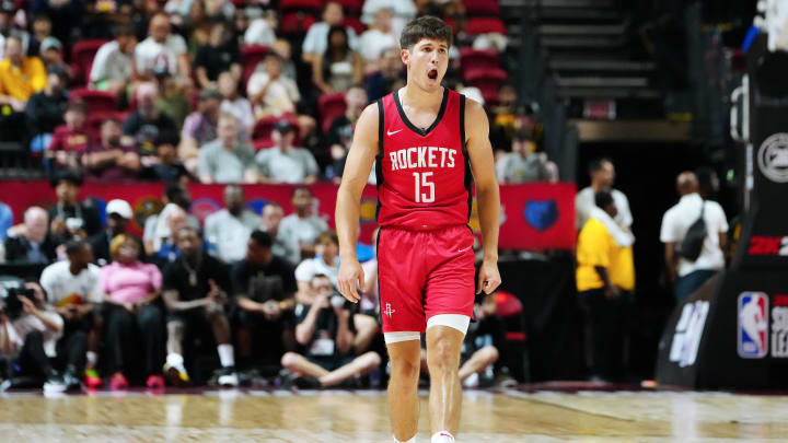 Jul 14, 2024; Las Vegas, NV, USA; Houston Rockets guard Reed Sheppard (15) reacts after scoring against the Washington Wizards during the third quarter at Thomas & Mack Center. Mandatory Credit: Stephen R. Sylvanie-USA TODAY Sports