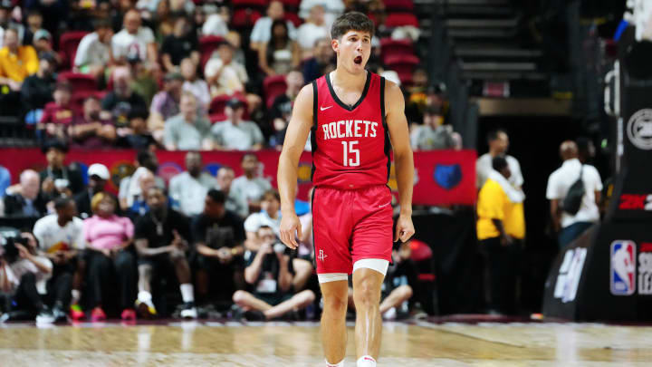 Jul 14, 2024; Las Vegas, NV, USA; Houston Rockets guard Reed Sheppard (15) reacts after scoring against the Washington Wizards during the third quarter at Thomas & Mack Center. Mandatory Credit: Stephen R. Sylvanie-USA TODAY Sports