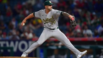 Jul 26, 2024; Anaheim, California, USA;Oakland Athletics pitcher Lucas Erceg (70) throws against the Los Angeles Angelsduring the ninth inning at Angel Stadium. Mandatory Credit: Gary A. Vasquez-USA TODAY Sports