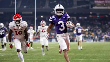 Dec 26, 2024; Phoenix, AZ, USA; Kansas State Wildcats running back Dylan Edwards (3) runs for a touchdown against the Rutgers Scarlet Knights during the second half of the Rate Bowl at Chase Field. Mandatory Credit: Mark J. Rebilas-Imagn Images