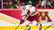 Apr 11, 2024; Saint Paul, Minnesota, USA; Boston College forward Ryan Leonard (9) carries the puck in the semifinals of the 2024 Frozen Four college ice hockey tournament during the second period against Michigan at Xcel Energy Center. Mandatory Credit: Brace Hemmelgarn-Imagn Images