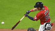 Sep 23, 2025; Cleveland, Ohio, USA; Cleveland Guardians left fielder Steven Kwan (38) doubles in the seventh inning against the Detroit Tigers at Progressive Field. Mandatory Credit: David Richard-Imagn Images