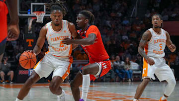 Tennessee guard Chaz Lanier (2) runs around UT Martin guard Tarence Guinyard (1) during an NCAA basketball game between the Tennessee Volunteers and UT Martin Skyhawks at Thompson-Boling Arena at Food City Center on Wednesday, Nov. 27, 2024. Mandatory Credit: Angelina Alcantar/USA TODAY NETWORK via Imagn Images