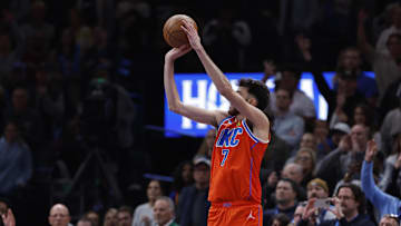 Nov 26, 2025; Oklahoma City, Oklahoma, USA; Oklahoma City Thunder center Chet Holmgren (7) shoots a three point basket against the Minnesota Timberwolves during the second half at Paycom Center. Mandatory Credit: Alonzo Adams-Imagn Images
