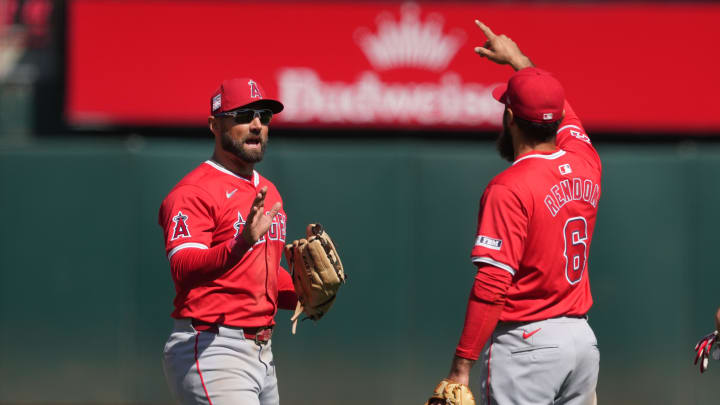 Jul 21, 2024; Oakland, California, USA; Los Angeles Angels center fielder Kevin Pillar (left) celebrates with third baseman Anthony Rendon (6) after defeating the Oakland Athletics at Oakland-Alameda County Coliseum. Mandatory Credit: Darren Yamashita-USA TODAY Sports