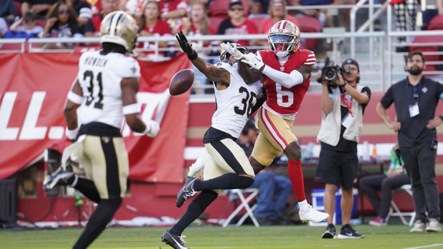 New Orleans Saints cornerback Rico Payton (36) breaks up a pass intended for San Francisco 49ers wide receiver Danny Gray (6)