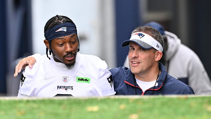 Josh McDaniels and Stefon Diggs before  minicamp at Gillette Stadium on Monday.