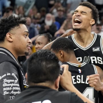 Apr 12, 2024; San Antonio, Texas, USA; San Antonio Spurs forward Victor Wembanyama (1) and teammates react after a victory over the Denver Nuggets at Frost Bank Center. Mandatory Credit: Scott Wachter-USA TODAY Sports