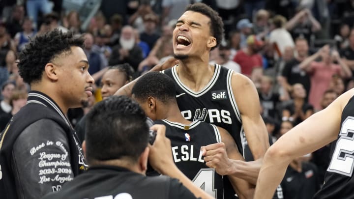 Apr 12, 2024; San Antonio, Texas, USA; San Antonio Spurs forward Victor Wembanyama (1) and teammates react after a victory over the Denver Nuggets at Frost Bank Center. Mandatory Credit: Scott Wachter-USA TODAY Sports