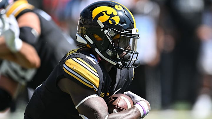 Sep 2, 2023; Iowa City, Iowa, USA; Iowa Hawkeyes running back Kaleb Johnson (2) runs the ball against the Utah State Aggies during the second quarter at Kinnick Stadium. Mandatory Credit: Jeffrey Becker-Imagn Images Sep 2, 2023; Iowa City, Iowa, USA; Iowa Hawkeyes running back Kaleb Johnson (2) runs the ball against the Utah State Aggies during the second quarter at Kinnick Stadium. Mandatory Credit: Jeffrey Becker-Imagn Images