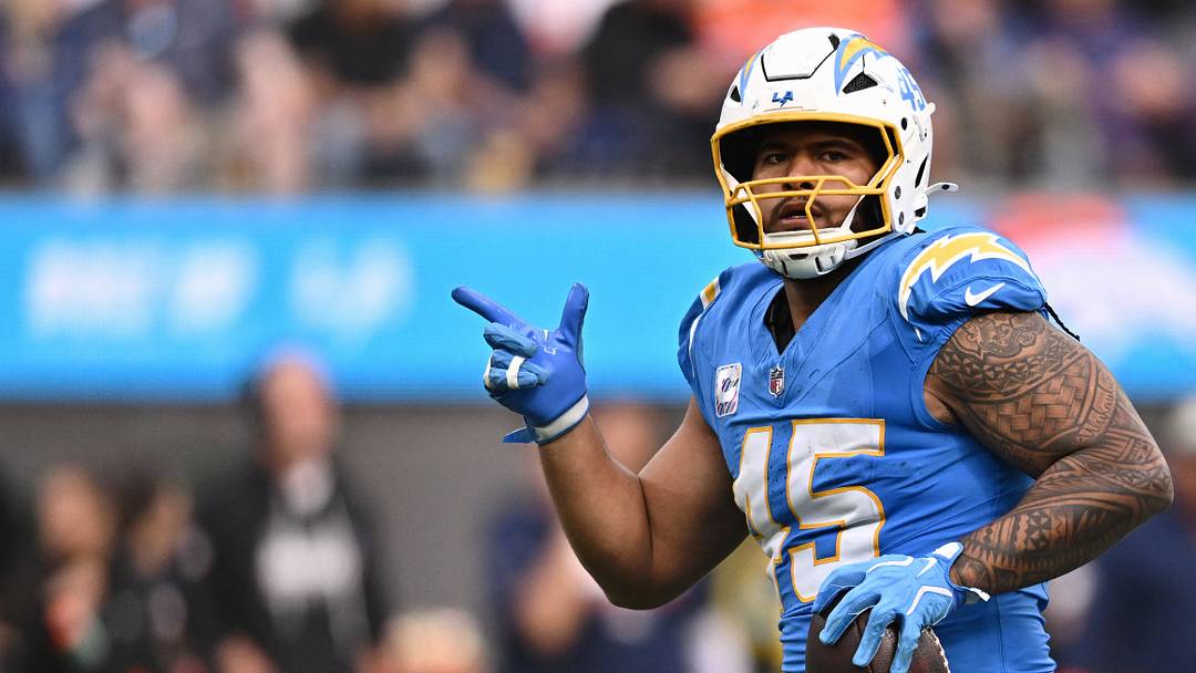 Oct 11, 2026; Inglewood, California, USA;  Los Angeles Chargers linebacker Tuli Tuipulotu (45) celebrates after a fumble recovery against the Denver Broncos during the second half at SoFi Stadium.  Mandatory Credit: William Liang-Imagn Images