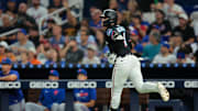 Sep 26, 2025; Miami, Florida, USA; Miami Marlins pinch hitter Connor Norby (1) circles the bases after hitting a two-run home run against the New York Mets during the fifth inning at loanDepot Park.