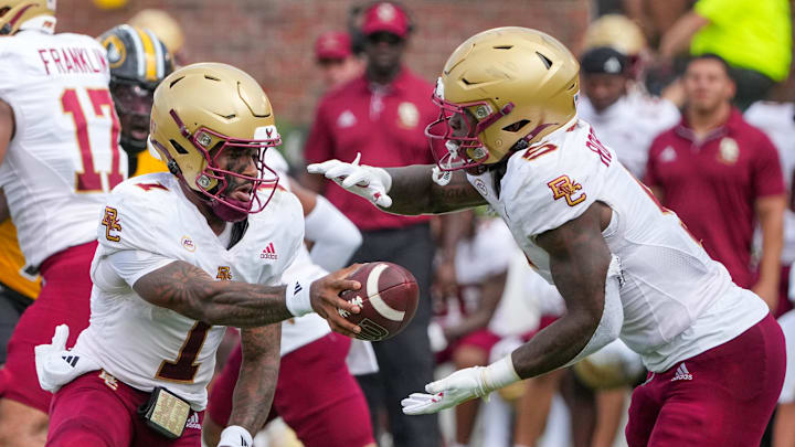 Sep 14, 2024; Columbia, Missouri, USA; Boston College Eagles quarterback Thomas Castellanos (1) hands off to running back Kye Robichaux (5) against the Missouri Tigers during the second half at Faurot Field at Memorial Stadium. Mandatory Credit: Denny Medley-Imagn Images