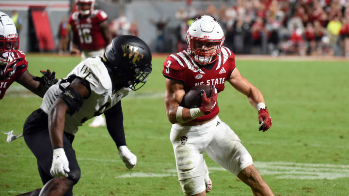 Nov 5, 2022; Raleigh, North Carolina, USA; North Carolina State Wolfpack running back Jordan Houston (3) runs the ball during the second half against the Wake Forest Demon Deacons at Carter-Finley Stadium.  The Wolf Pack won 30-21. Mandatory Credit: Rob Kinnan-USA TODAY Sports