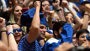 Duke football head coach Manny Diaz attending a Duke basketball home game