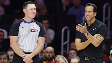 Dec 6, 2025; Miami, Florida, USA;  Miami Heat head coach Erik Spoelstra argues a call with referee Ed Malloy (14) against the Sacramento Kings during the second half at Kaseya Center. Mandatory Credit: Rhona Wise-Imagn Images