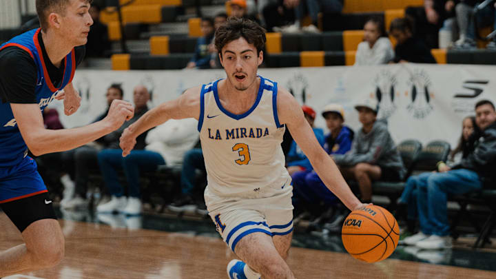 La Mirada guard Julien Gomez drives to the rim in the Classic at Damien.
